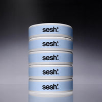 Five cans of Sesh+ Mint nicotine pouches, stacked